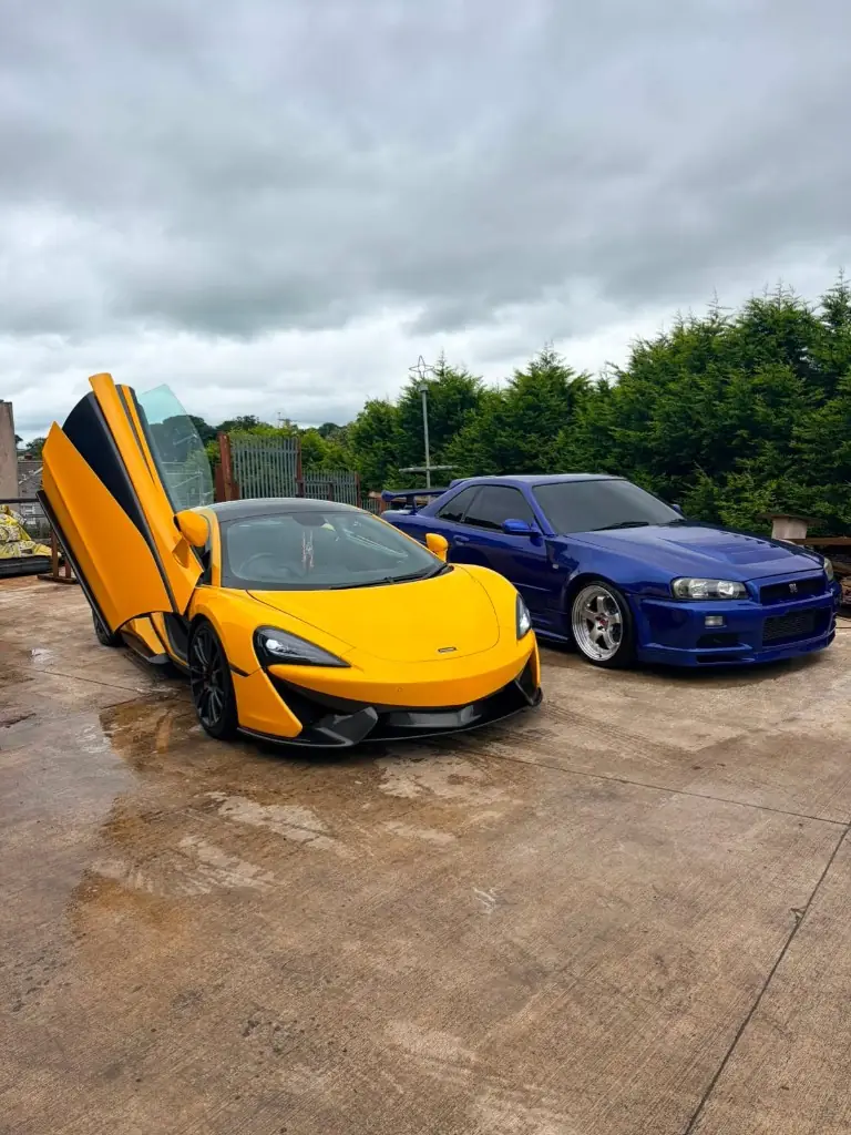 Yellow McLaren and blue Skyline together