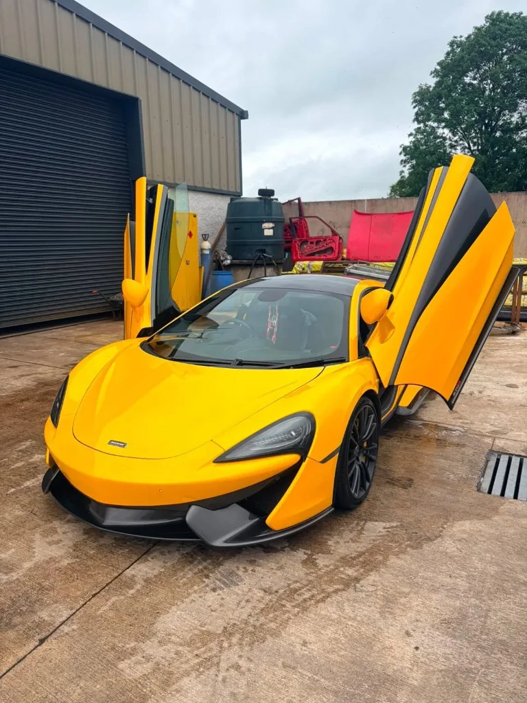 Yellow McLaren after a gloss enhancement machine polish by Karno Auto Styling